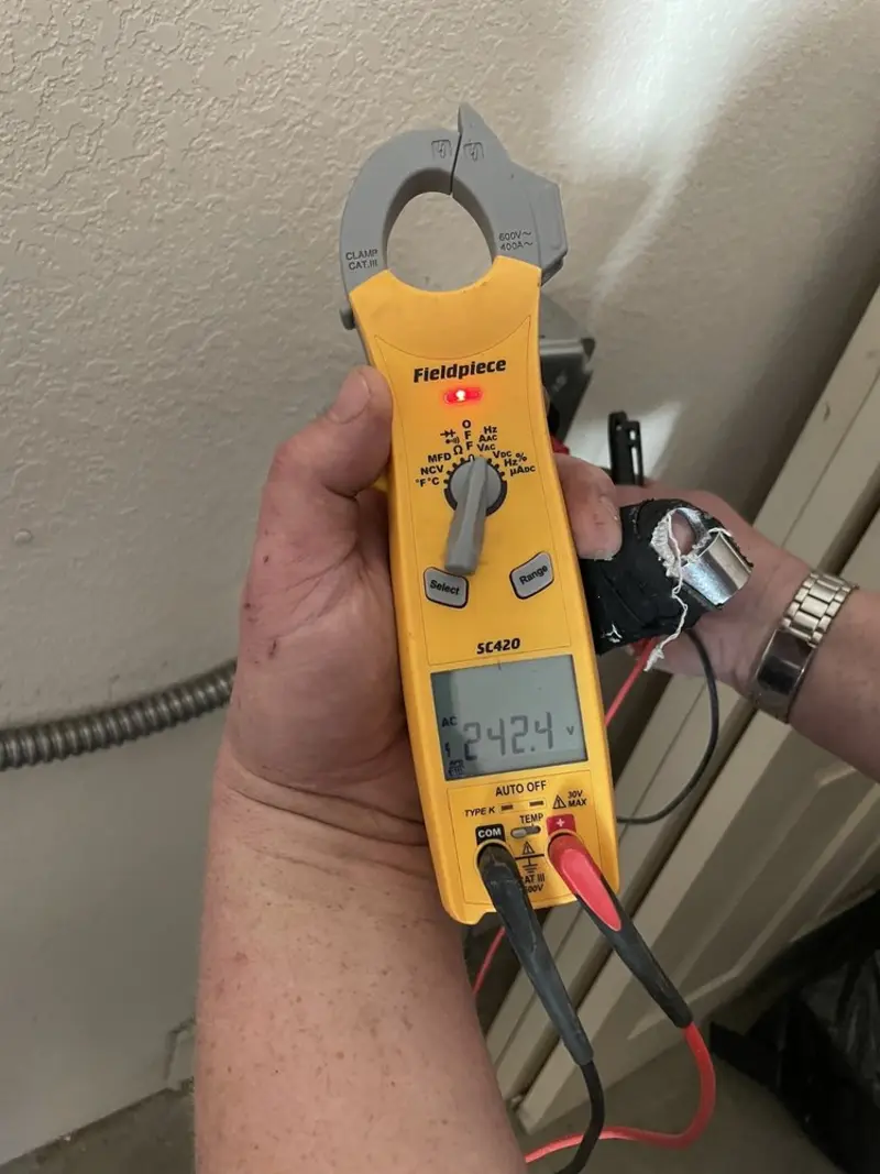 Voltage testing with clamp meter during Hot Tub / Pool Electrical Wiring in Amsterdam